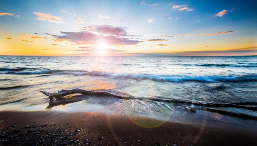 Image of beach at sunset using multiple blended images